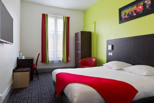 Foto de una habitación de Enzo Hôtel Contrexeville