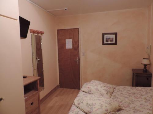 Foto de una habitación de Hôtel Le Lievre Blanc