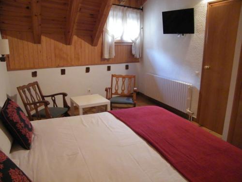 Foto de una habitación de Hotel Lamoga