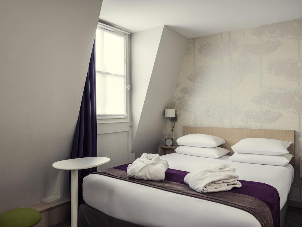 Foto de una habitación de Hotel Mercure Paris Notre Dame Saint Germain des Prés