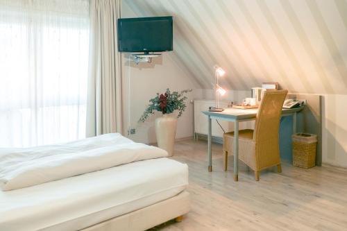 Foto de una habitación de Hotel Ambiente Langenhagen Hannover by Tulip Inn