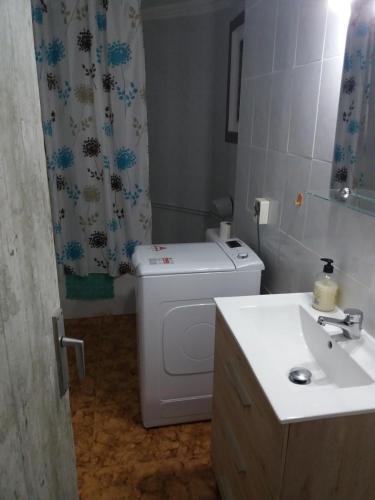 Foto del baño de Habitaciones cerca del mar