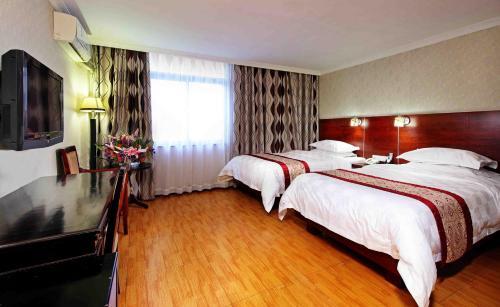 Foto de una habitación de Guang Dong Hotel