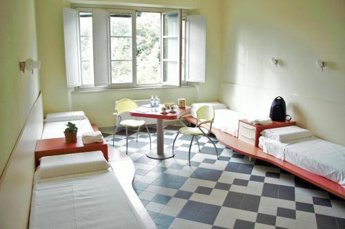 Foto de una habitación de Ostello La Miniera