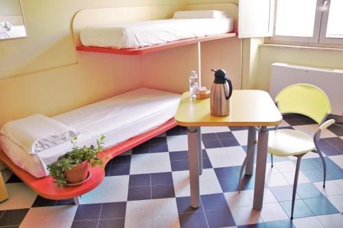 Foto de una habitación de Ostello La Miniera