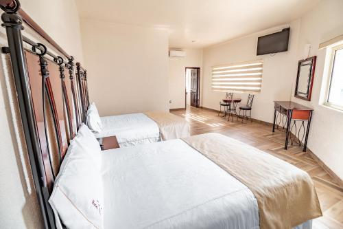 Foto de una habitación de Hotel Alcazar - Guadalajara Centro Historico