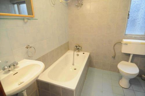 Foto del baño de Alborada Apart Hotel