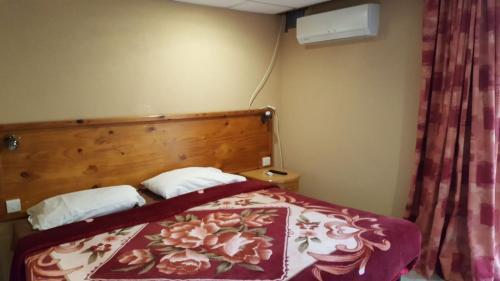 Foto de una habitación de Alborada Apart Hotel