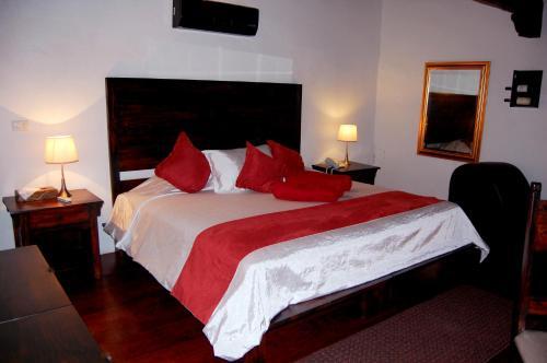 Foto de una habitación de Hotel Boutique Casabella