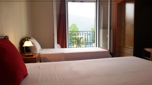 Foto de una habitación de Aparthotel Paradosi Rooms