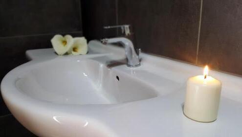Foto del baño de Aparthotel Paradosi Rooms