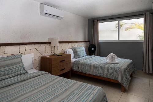 Foto de una habitación de Hotel Amar Inn