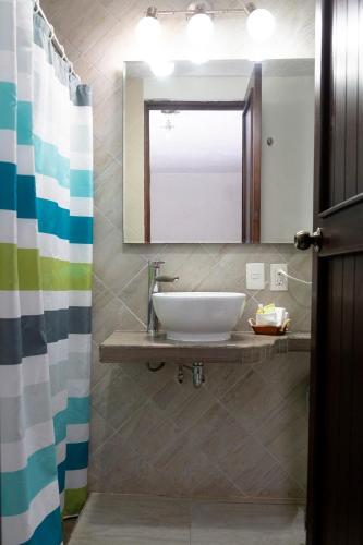 Foto del baño de Hotel Amar Inn