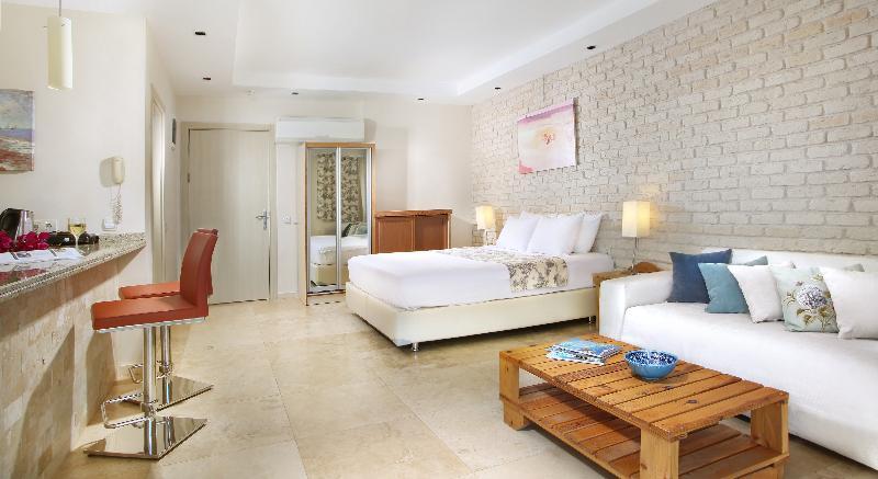 Foto de una habitación de Hotel Saylam Suites