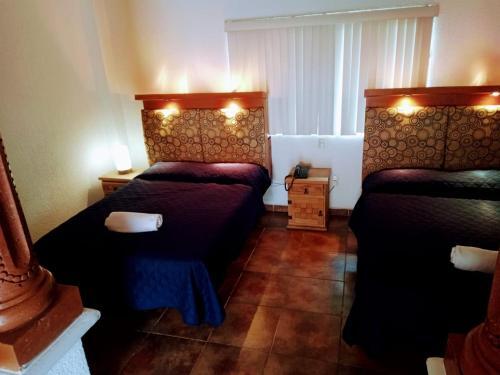 Foto de una habitación de Hotel Leyenda del Tepozteco