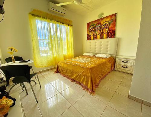 Foto de una habitación de El Malecon B&amp;amp;B Hotel