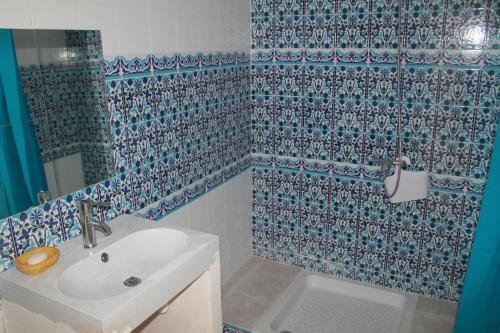 Foto del baño de Apartamentos La Maison Des Oliviers