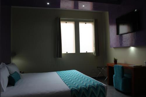 Foto de una habitación de Hotel Orizaba Inn