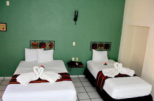 Foto de una habitación de Hotel Aldama