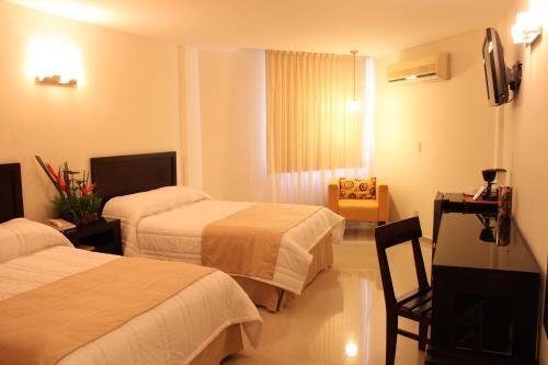 Foto de una habitación de Hotel Mesón de la Chinantla