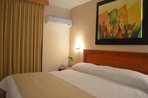 Foto de una habitación de Hotel Mesón de la Chinantla