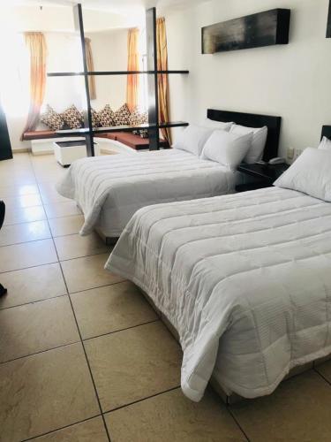 Foto de una habitación de Hotel Aldea del Bazar