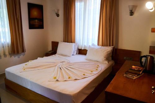 Foto de una habitación de Aida Hotel
