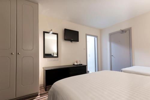 Foto de una habitación de Ivy Tower Hotel