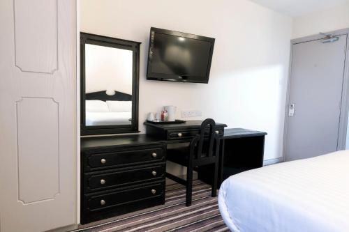 Foto de una habitación de Ivy Tower Hotel