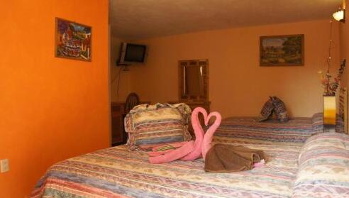 Foto de una habitación de Hotel Posada Tolteca