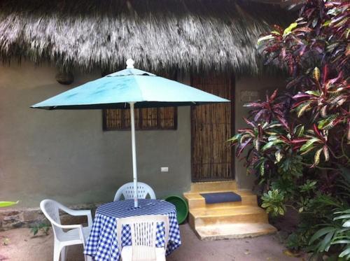 Foto de una habitación de Junto al Rio Bungalows &amp;amp; Suites