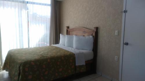 Foto de una habitación de Hotel La Vista