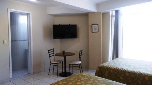 Foto de una habitación de Hotel La Vista