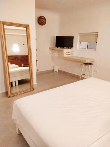 Foto de una habitación de Hotel Caracol Puerto