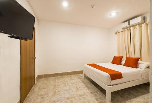 Foto de una habitación de Hotel Caracol Puerto