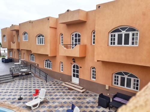 Foto de una habitación de AMWAJ HOTEL