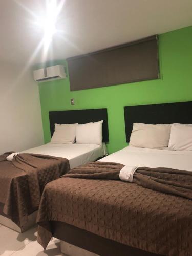 Foto de una habitación de Hotel Playa Victoria