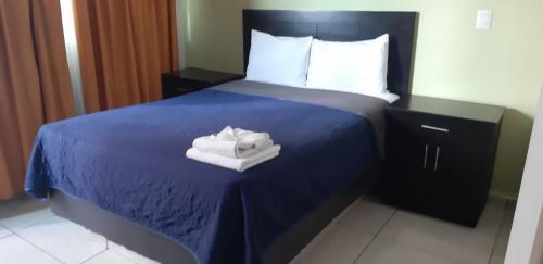 Foto de una habitación de Hotel Playa Victoria