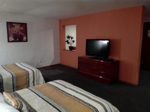 Foto de una habitación de Hotel La Loma