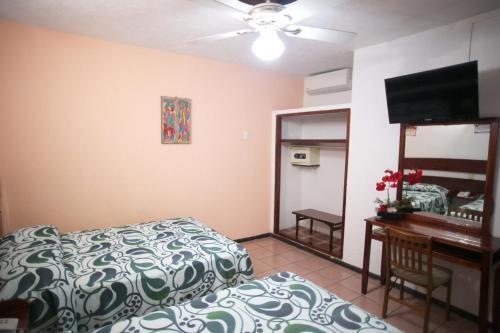 Foto de una habitación de Hotel Maria De Lourdes