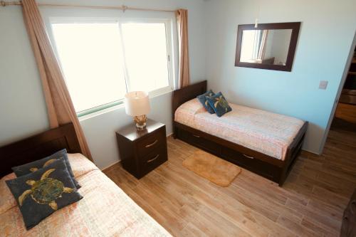 Foto de una habitación de Alquileres Vacacionales Maz4you Beachfront Condo