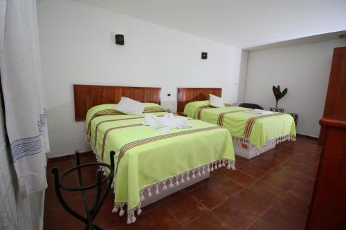 Foto de una habitación de Villa Blanca Suites