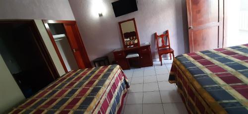 Foto de una habitación de Hotel San Miguel