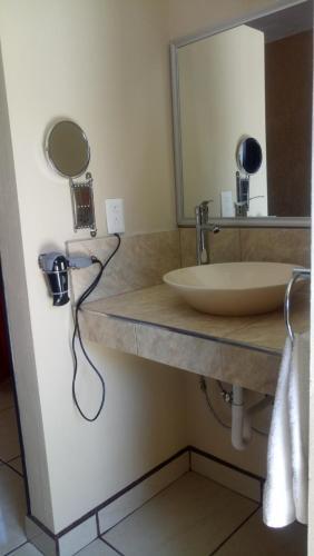 Foto de una habitación de Hotel Brambila
