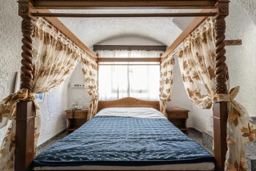 Foto de una habitación de Hotel Porto Perissa