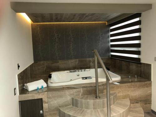 Foto del baño de Kaia Suites