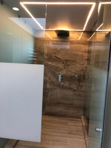 Foto del baño de Kaia Suites