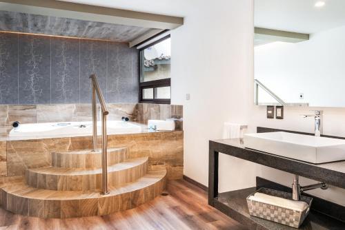 Foto de una habitación de Kaia Suites