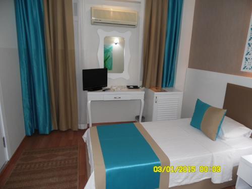 Foto de una habitación de Nasa Flora Hotel