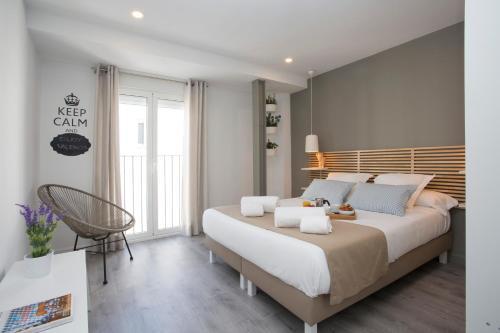 Foto de una habitación de Apartamentos SingularStays Mercado Central